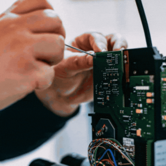 Technician performing repair